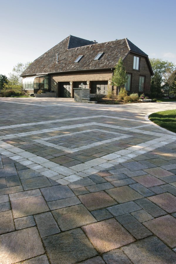 Driveway featuring Unilock Il Campo and Brussels Block banding