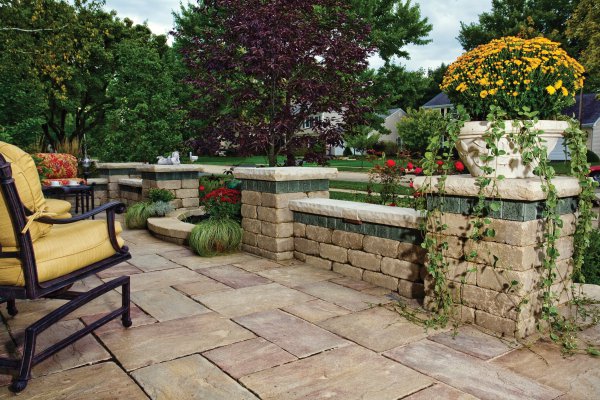 Front entrance with Rivenstone paver and garden wall by Unilock