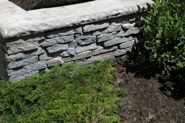 Close up of Unilock garden wall with Rivercrest