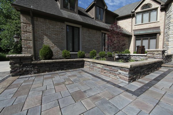 Front entrance with Rivercrest garden walls by Unilock