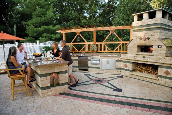 Outdoor Living Pool Deck and kitchen featuring Brussels Block paver