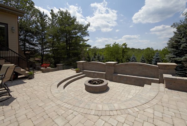 Outdoor Living Patio with Fire Pit and wall using Brussels Block paver