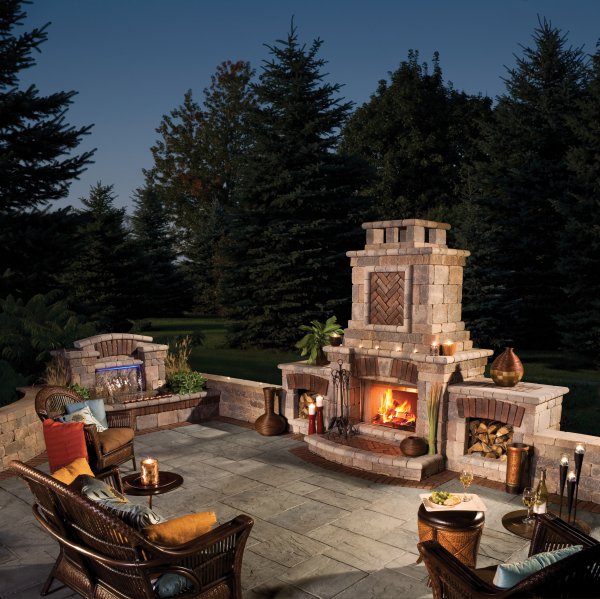 Rivenstone paver patio with fireplace by Unilock