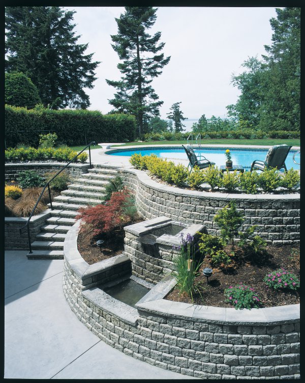 Unilock Pool Deck with Roman Pisa Wall