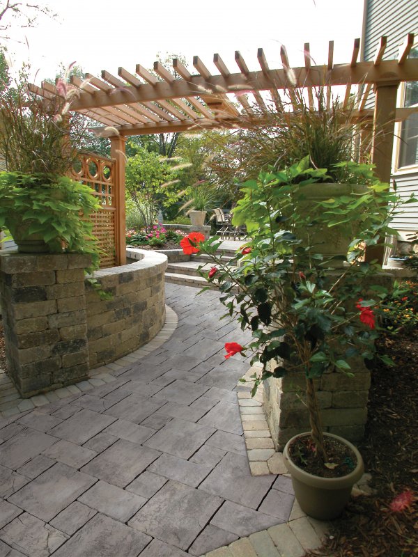 Patio and walkway by Unilock with Thornbury paver