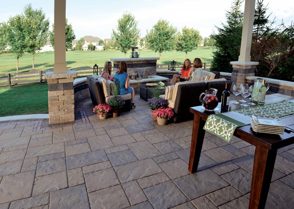 Patio and Water Feature with Beacon Hill Flagstone and Copthorne paver