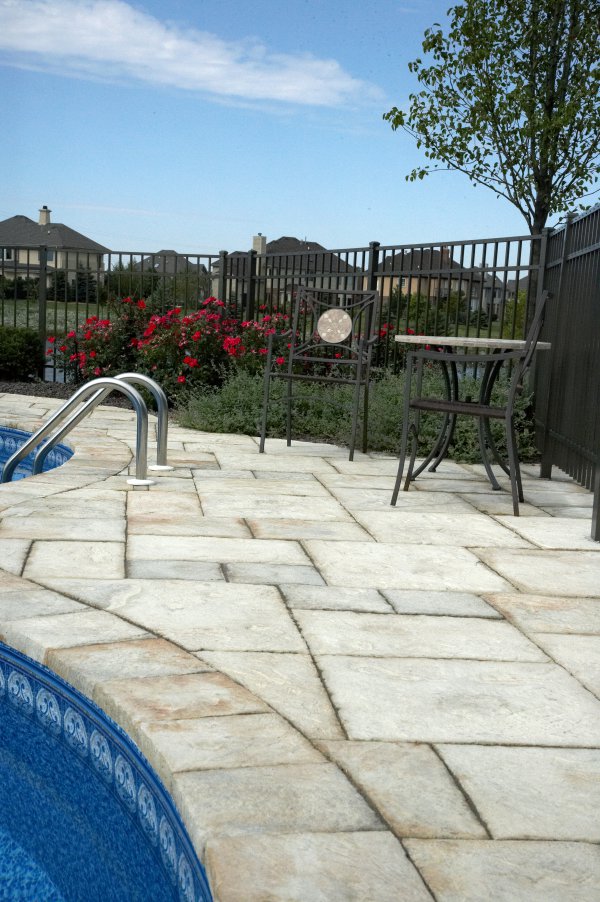 Unilock pool deck with Yorkstone paver