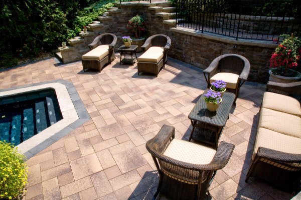 Paver patio and pool deck by Unilock with Umbriano